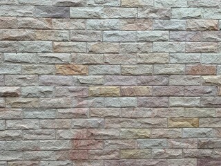 Natural white color stone brick wall background. Wide angle background.