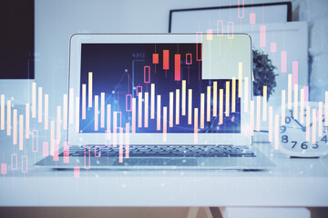 Forex Chart hologram on table with computer background. Double exposure. Concept of financial markets.