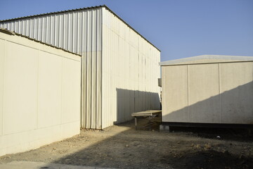Industrial warehouse construction and interior and outdoor view of the roof ceiling structure. Muscat, Oman