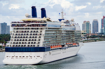 Modern Celebrity luxury cruiseship or cruise ship liner Equinox in port of Miami, Florida heading...