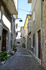 A narrow street between the old houses of the town of Vico nel Lazio, in the province of Frosinone.