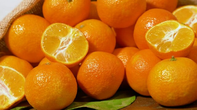 fresh mandarin oranges fruit on wooden table