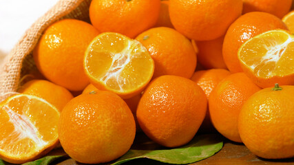 fresh mandarin oranges fruit on wooden table