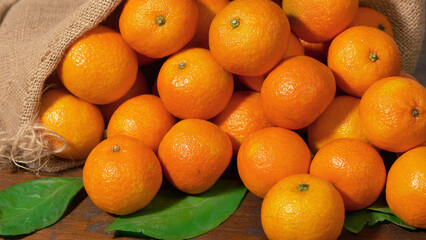 fresh mandarin oranges fruit on wooden table