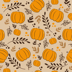 Autumnal seamless pattern - pumpkins and leaves, on beige background. Good for wall paper, wrapping paper, textile print and decoration.