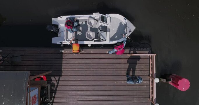Three special Force Soldiers get into the boat and sail away