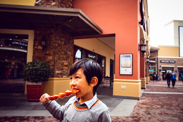 kid eating child eating candy