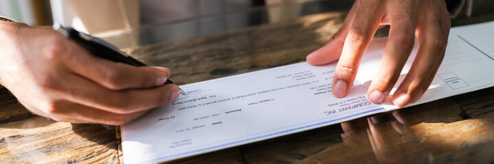 African Writing Money Cheque. Sign Check