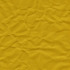Yellow vintage and old looking crumpled paper background. Retro cardboard texture. Grunge paper for drawing. Ancient book page. Present wrapping.