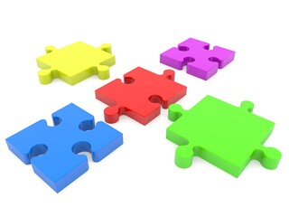 Five colored puzzle pieces not connected to each other on white