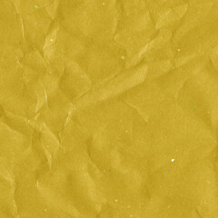 Yellow vintage and old looking crumpled paper background. Retro cardboard texture. Grunge paper for drawing. Ancient book page. Present wrapping.