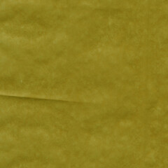 Yellow vintage and old looking crumpled paper background. Retro cardboard texture. Grunge paper for drawing. Ancient book page. Present wrapping.