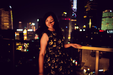 woman dancing in night city