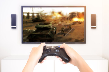 Player playing console war game videogame holding gamepad - high key image