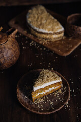 carrot cake slice of one piece, home baking photo in dark colors. High quality photo