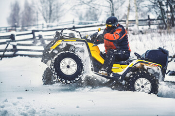 Winter walk on the quad bike in the forest.