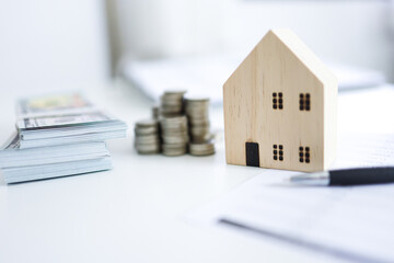 Saving money for Real estate investment with with stack of money coins for buying home and loan for prepare in the future financial or insurance concept