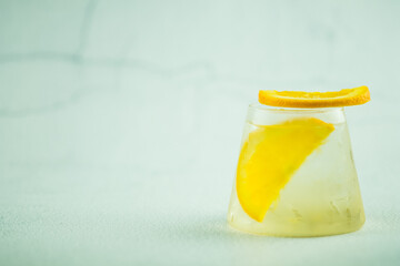 Cool water with fresh orange slice