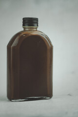 Fresh chocolate milk with straw a traditional bottle