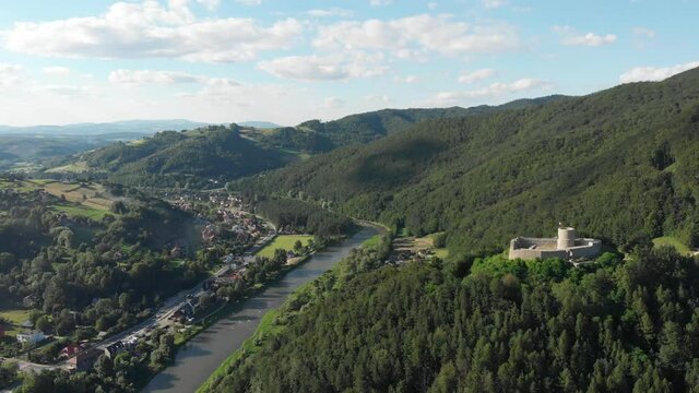Beskid Mountains and medieval castle in forest. Rytro, Poland.