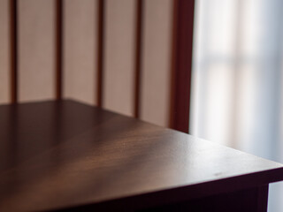 Light and shadows being cast through a paper door