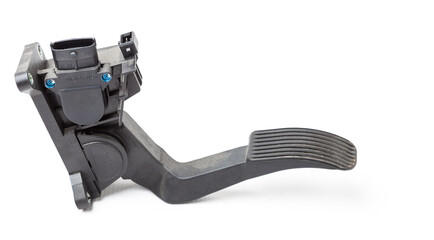 Gas pedal on a white isolated background in a photo studio for sale in a car service. Black auto...