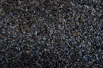 close shot of black Niger seeds background