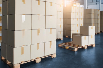 Cargo boxes, Shipment, Manufacturing and warehousing. Stack of cardboard boxes on pallet at the warehouse storage.