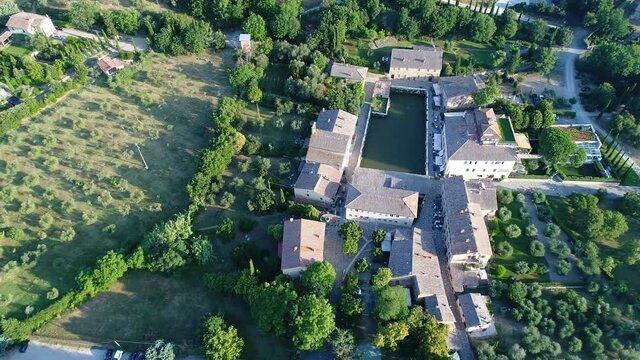Aerial view of Bagno Vignoni a village in Val D'orcia. Spas, nature and a beautiful landscape