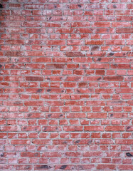old red brick wall of an old building for the whole frame