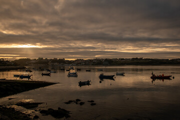 Fototapeta na wymiar Fishing boats during sunrise