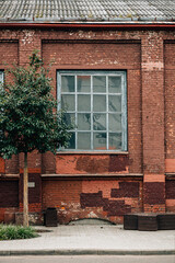 Fototapeta na wymiar Old wall city vintage sullen urban street industrial soviet plant background vertical architecture wallpaper. 