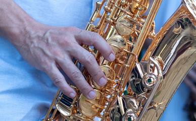 International jazz day and World Jazz festival. Saxophone, music instrument played by saxophonist...