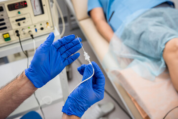 Cardiologist use tubes for radiofrequency catheter ablation.