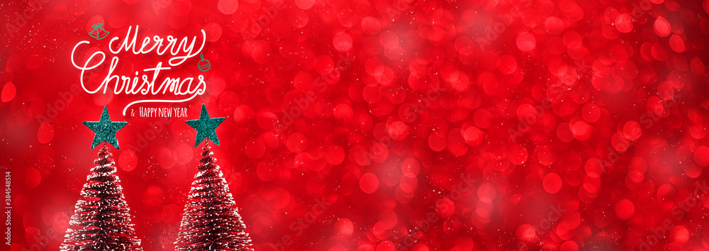 Poster merry christmas and happy new year text over xmas tree and green start on red glitter sparkling ligh
