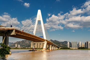 Fototapeta na wymiar Wenzhou Oubei Bridge and urban architectural landscape