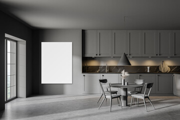 Modern gray kitchen with dining table and poster