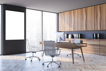 Naklejka na ściany i meble Modern gray CEO office with wooden cabinets and poster