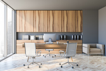 Modern gray CEO office interior with wooden cabinets