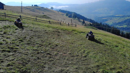 Fototapeta na wymiar Quad bike is good vehicle for mountains ride. Beautiful green hills.