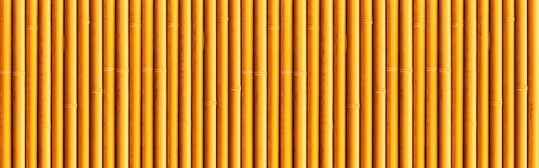 Panorama of Bamboo wall or Bamboo fence texture. Old brown tone natural bamboo fence texture...
