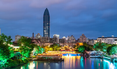 Obraz premium The night view of ancient buildings and modern urban buildings in Nantang Street, Wenzhou