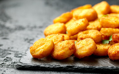 Mini hash browns, tater tots crispy golden potato bites served with jalapeno peppers dipped in...
