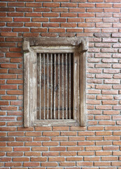 Fototapeta na wymiar Old wood window in old brick wall background