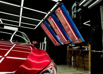 Infrared lamps for drying of car body parts after applying save gloss coating