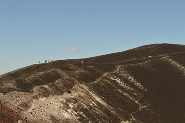 Hiking and snowboarding in the volcanic ashes on the Nicaraguan Volcanoes outside of Léon, Central America