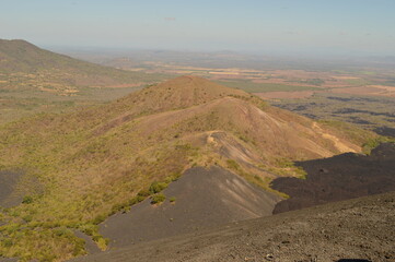 Hiking and snowboarding in the volcanic ashes on the Nicaraguan Volcanoes outside of Léon, Central America