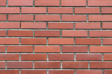 Background texture of a red brick wall.