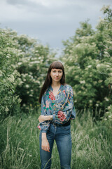 Fototapeta premium portrait of smiling woman in nature