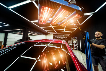 Infrared lamps for drying of car body parts after applying save gloss coating